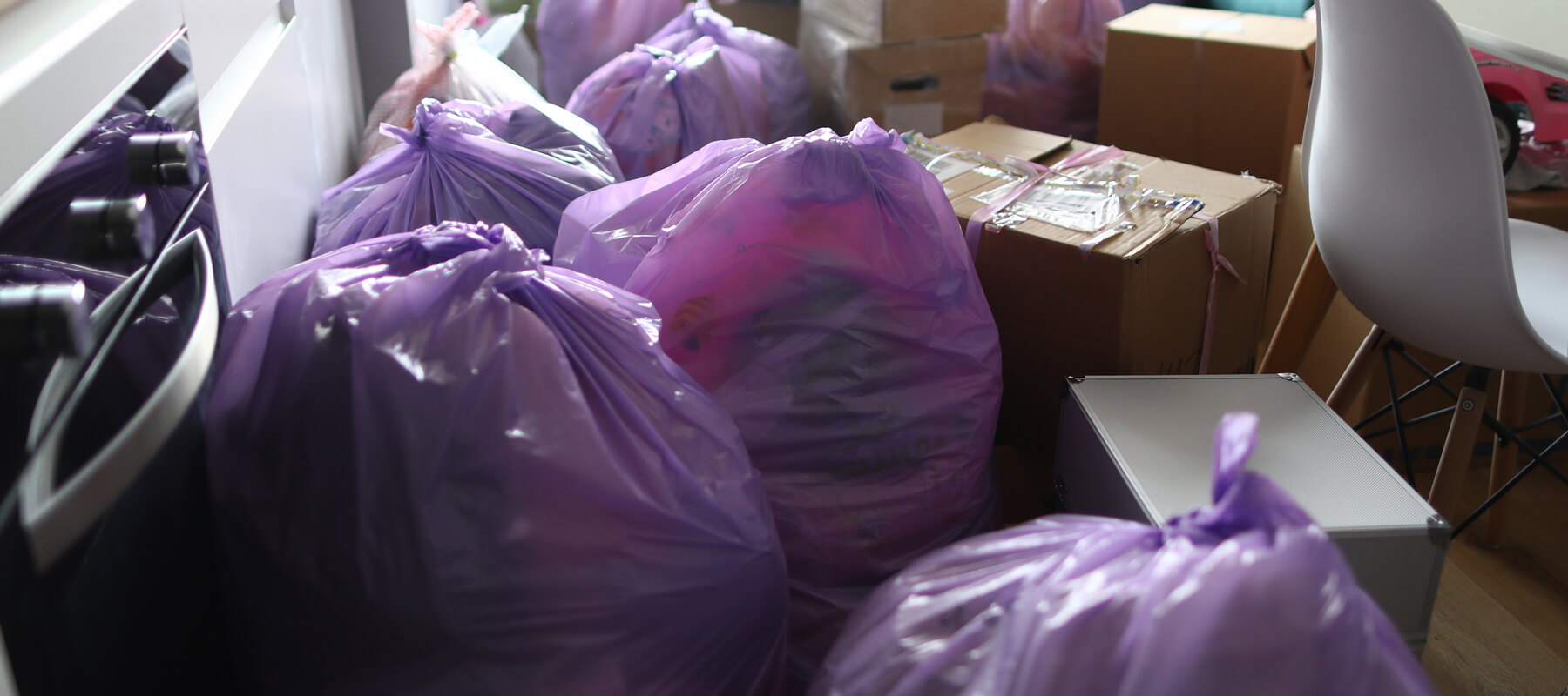 Kitchen Is Full Garbage Bags And Cardboard Boxes